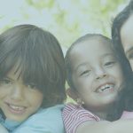 young happy family in park