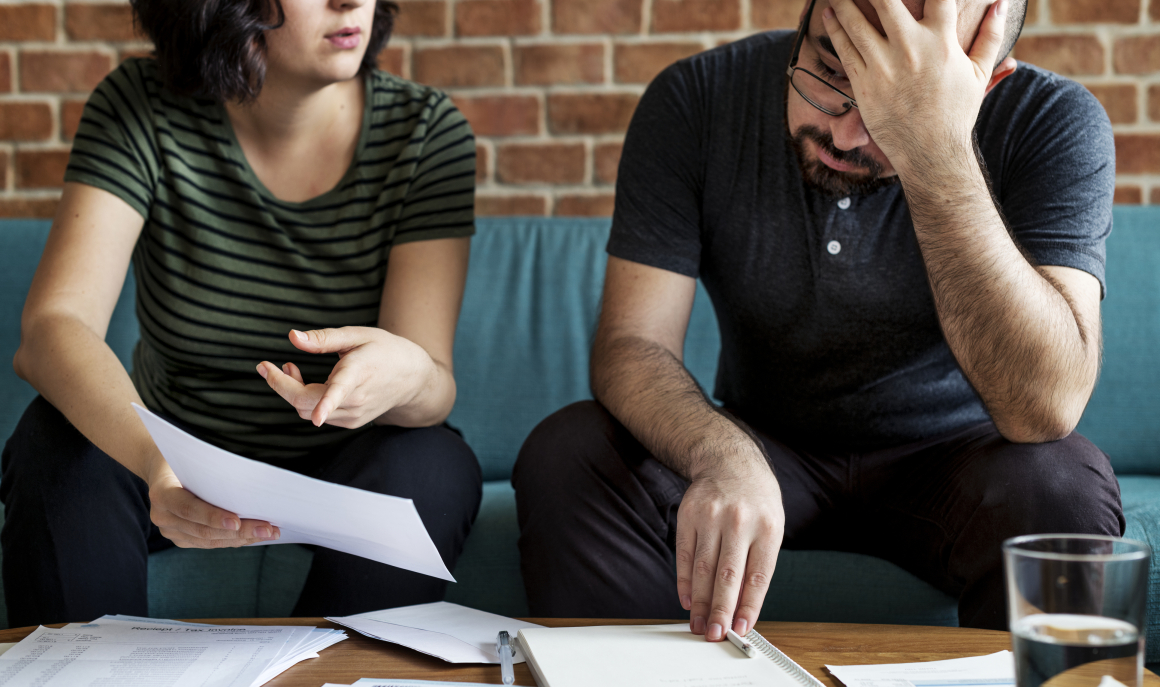 Couple managing the debt
